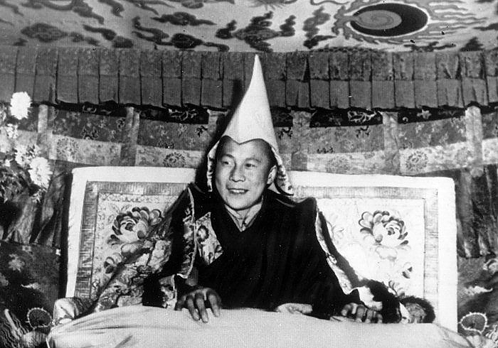 The Dalai Lama, fifteen years old, ruler of Tibet.